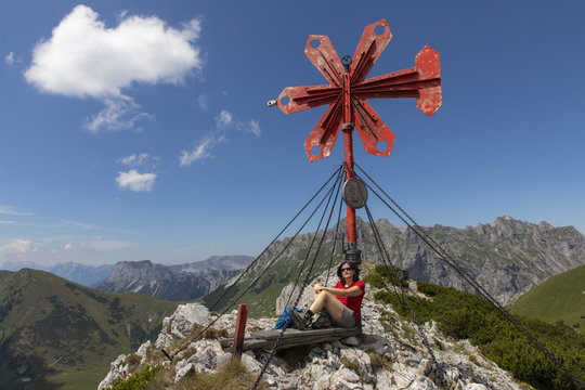 woman on the summit of leobner mauer, peak in the mountain range hochschwab, styria,austria