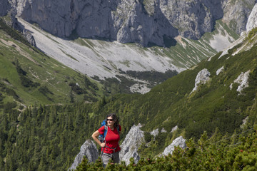 Fototapeta na wymiar woman hiking on mountain range hochschwab, styria,austria,