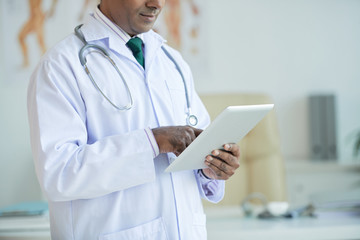 Doctor with digital tablet