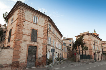 Fototapeta na wymiar Street view of Fermo with old living houses