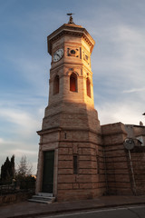 Fototapeta na wymiar Fermo town, Italy. Old clock tower facade