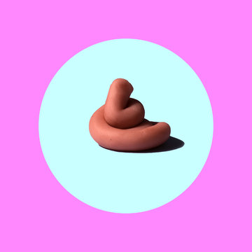 pink poo  on colorful background, funny poop concept, pop minimal contemporary style
