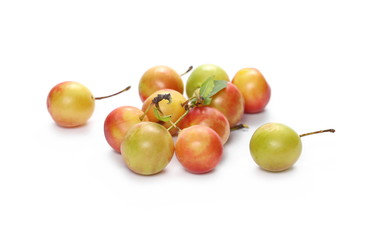 Wild plums isolated on white background