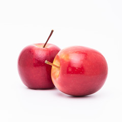 Two  fresh ripped red apples isolated on white background.