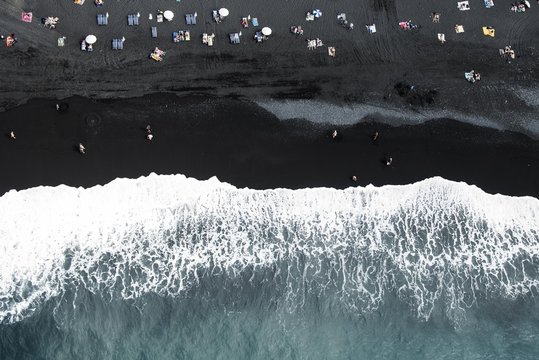 Surf, bathing people on black lava beach, Puerto Naos, La Palma, Canary Islands, Spain, Europe