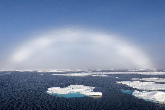 White rainbow over pack ice, Arctic Ocean, Spitsbergen, Svalbard archipelago, Norway, Europe