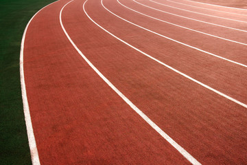 Fototapeta premium Red running track in stadium