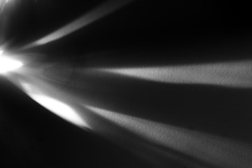 Rays emitted from crystal on black background