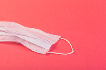 Protective face mask  on colored background