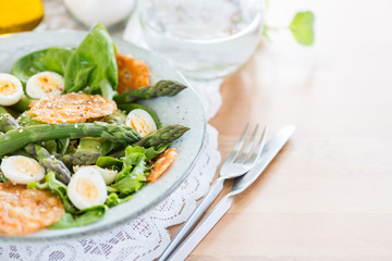 Asparagus Salad with quails eggs and cheese crisps