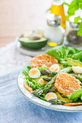 Asparagus Salad with quails eggs and cheese crisps