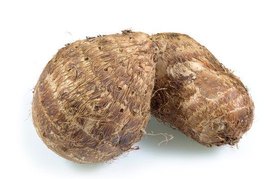 Root of sweet taro or tropical organic asian sweet potato isolated on white background, healthy concept.
