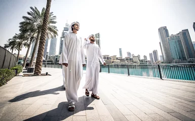 Gordijnen Three arabic business men spending time in Dubai © oneinchpunch