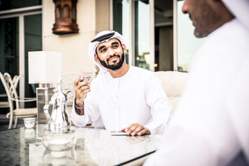 Fototapeta na wymiar arabic business men spending time in Dubai