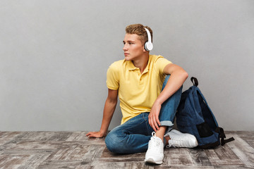 Portrait of a casual teenage boy in headphones