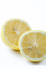 Lemons halves isolated on white background. Healthy lifestyle concept. Copy space