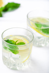 Basil lemon water. Drink infused water cocktail. Healthy lifestyle concept. Copy space