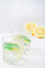 Basil lemon water. Drink infused water cocktail. Healthy lifestyle concept. Copy space
