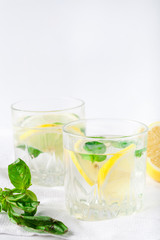 Basil lemon water. Drink infused water cocktail. Healthy lifestyle concept. Copy space