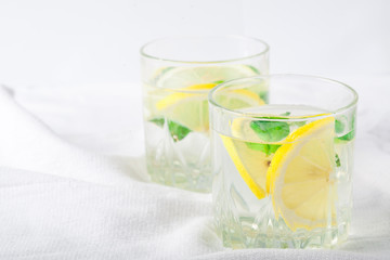 Basil lemon water. Drink infused water cocktail. Healthy lifestyle concept. Copy space