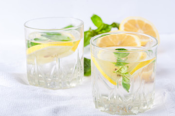 Basil lemon water. Drink infused water cocktail. Healthy lifestyle concept. Copy space