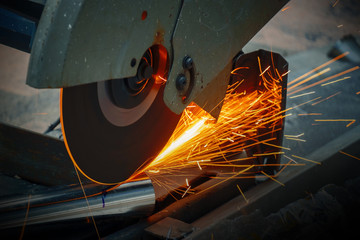 Worker Use Chop Saw to Cutting a Thick Stainless Steel Tube in a Construction Work Site.