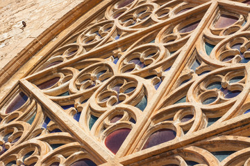 The largest rose window of the Cathedral of Santa Maria of Palma, also known as La Seu, from the outside. Palma, Mallorca, Spain