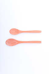 Wooden spoon isolated on white background