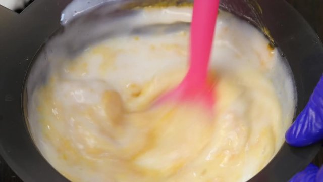 process of mixing of components for reception without an aldehyde paint in a beauty salon. 4K