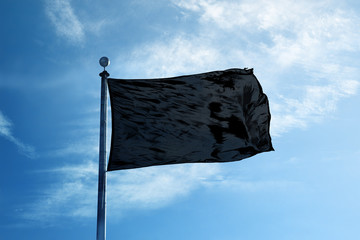 Black flag on the mast