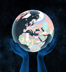 Kosovo on political globe in hands