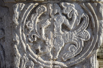 relief on the wall of the ancient cathedral