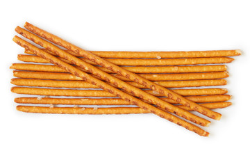 Group of salted pretzel sticks isolated on white background