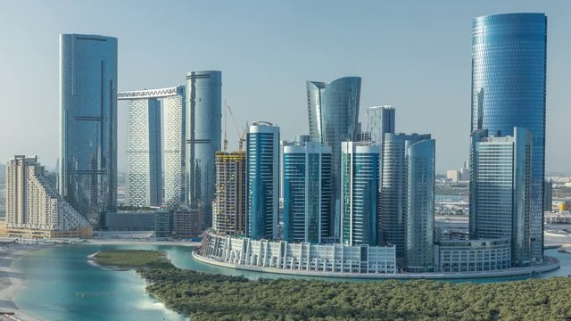 Buildings on Al Reem island in Abu Dhabi timelapse from above.