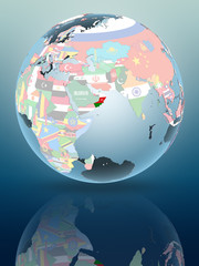 Obraz premium Oman on globe with flags