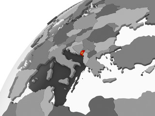 Fototapeta premium Montenegro with flag on globe