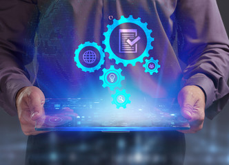 The concept of business, technology, the Internet and the network. A young entrepreneur working on a virtual screen of the future and sees the inscription: