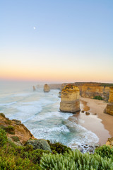 Sunrise and moonrise at the twelve Apostles along the famous Great Ocean Road in Victoria, Australia