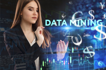 The concept of business, technology, the Internet and the network. A young entrepreneur working on a virtual screen of the future and sees the inscription: Data mining