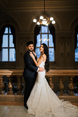 Beautiful elegant wedding couple in the palace