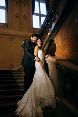 Beautiful elegant wedding couple in the palace