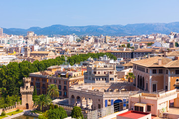 View over the rooftops  of Palma and Tramuntana mountains from  the terrace of the Cathedral of Santa Maria of Palma, also known as La Seu © Jeanne Emmel