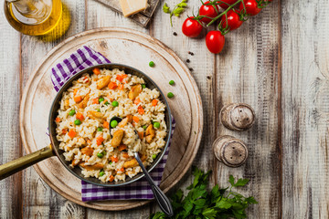 Delicious risotto with chicken and green peas.