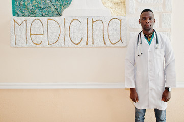 African american doctor student male at lab coat with stethoscope inside medical university.
