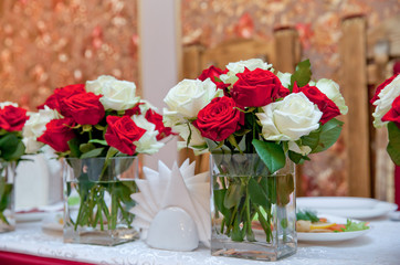 bouquets of red and white roses