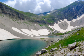 Mountain landscape with high altitude lake (Pilato lake)  in the National Park of the Sibillini Mountains in Italy