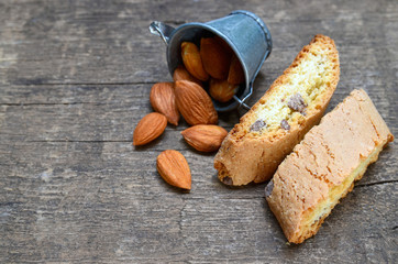 Traditional italian cantuccini almond cookies on old wooden background.Delicious homemade cantucci biscotti.Selective focus.