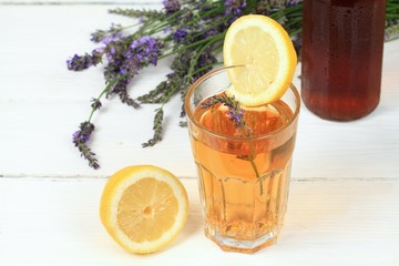 Homemade lavender syrup in  bottle & lemonade / Made from fresh aromatic lavender flowers, sugar or honey and lemon juice