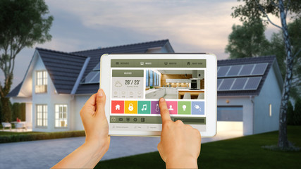 Fototapeta Haus gesteuert mit Smart Home Technologie auf Tablet obraz