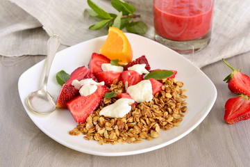 Fresh strawberries, yogurt and homemade granola for  healthy breakfast